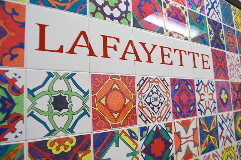 Colorful mosaic tiles surround the word Lafayette